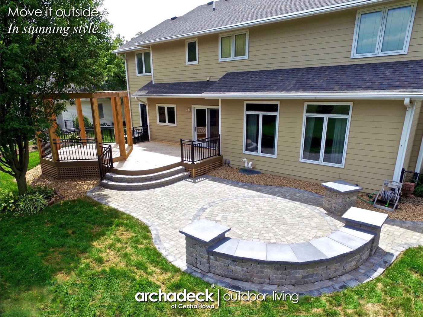A house with a patio and a stone patio

AI-generated content may be incorrect.